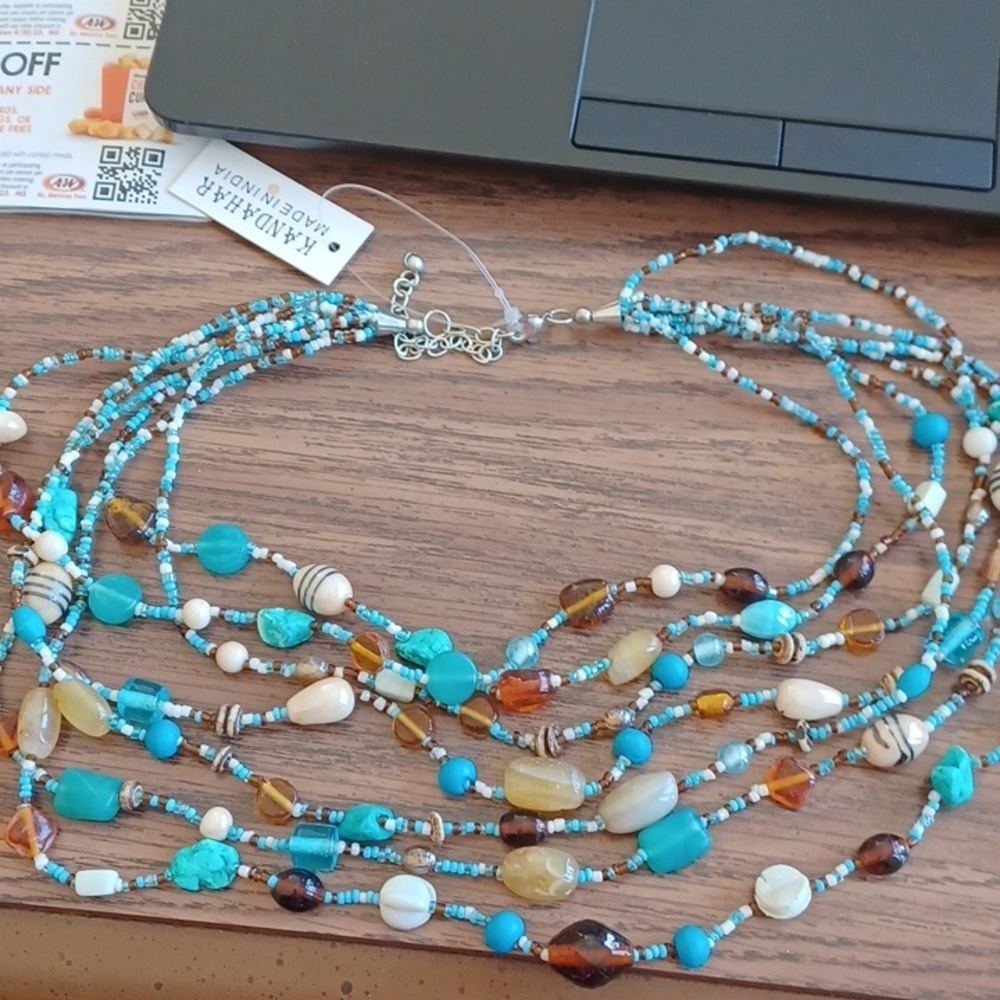 Beaded necklace. NWT. 7 strands, 10"-23" drop